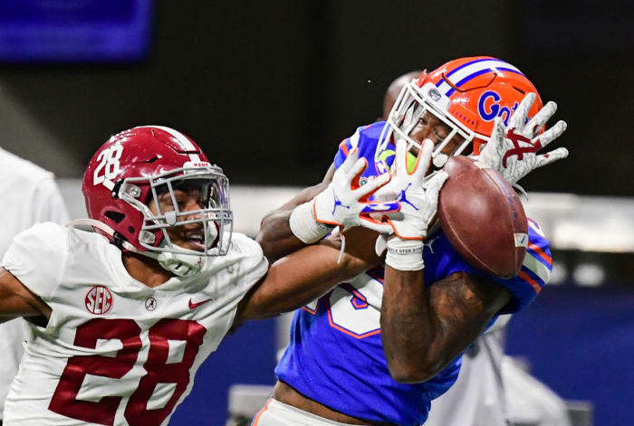 Alabama Crimson Tide defensive back Josh Jobe (28) defends a pass against Florida Gators wide receiver Jacob Copeland (15) at Mercedes-Benz Stadium